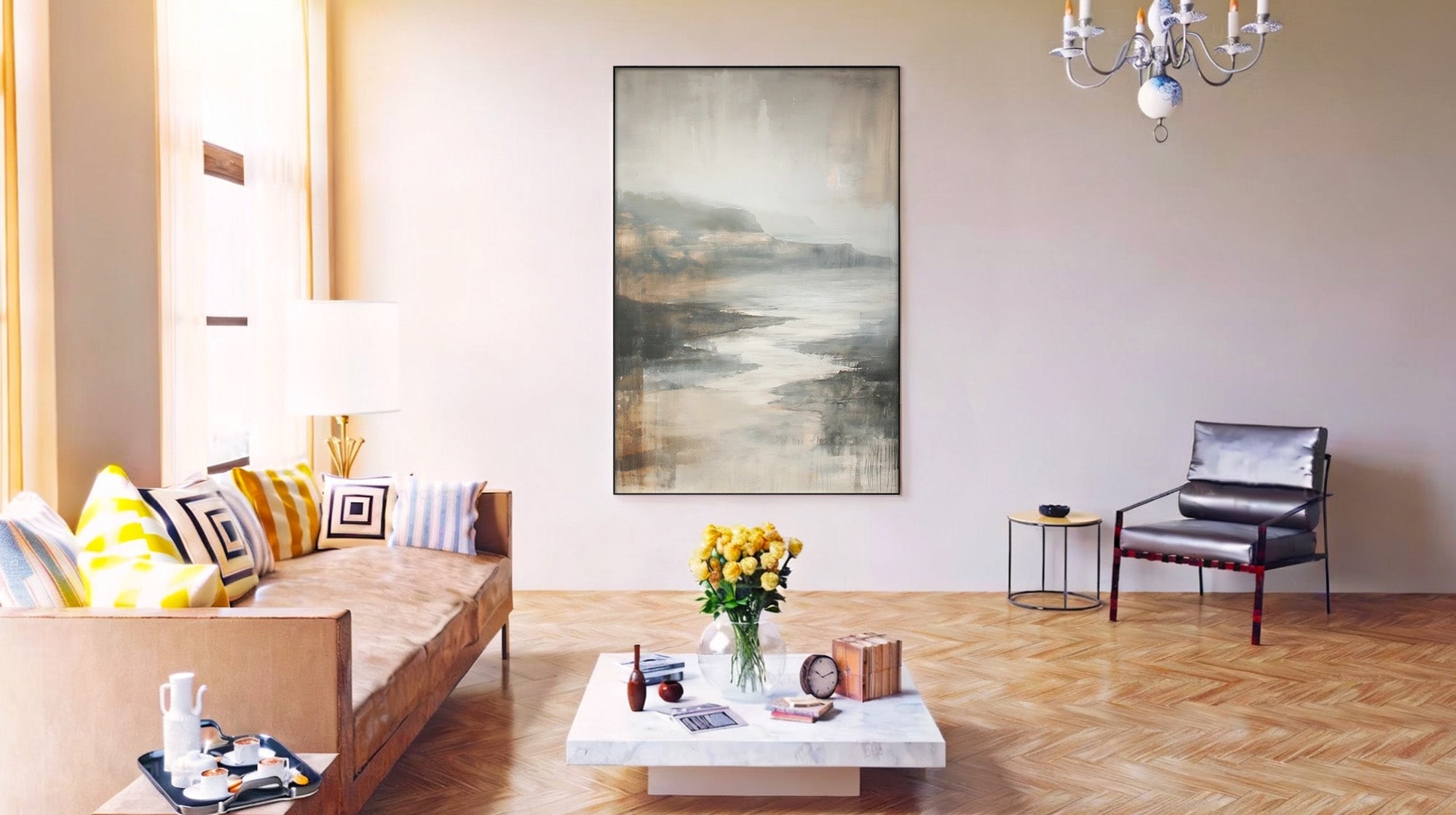 Mont Cart living room featuring a minimalist leather sofa, a landscape canvas, and a modern marble coffee table.