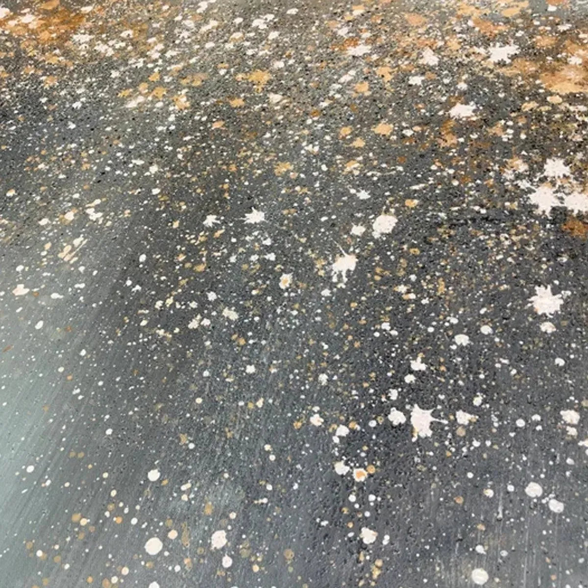 Close-up: Textured Aurora Dust abstract ocean painting with speckled grey, white, gold, brown.