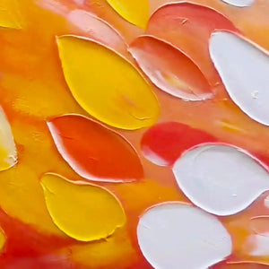 Close-up of Rainbow Burst impasto painting texture: thick yellow, orange, white strokes on warm background.