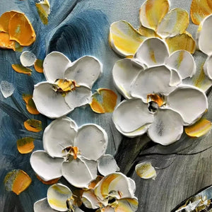 Impasto floral detail: sculptural white blossoms with gold & yellow accents on blue/gray, from 'Spring Blossoms' painting.