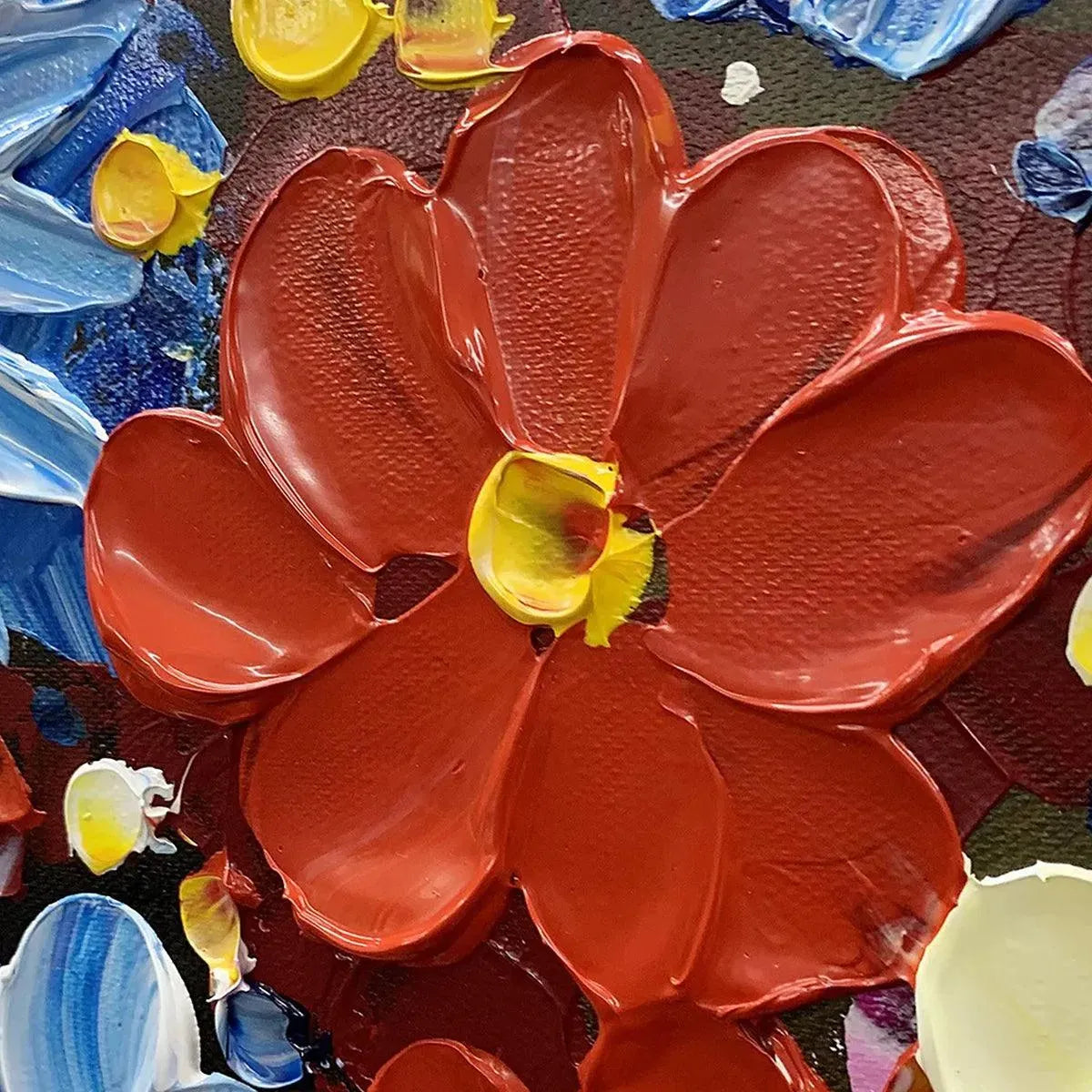 Close-up of vibrant red impasto flower with thick textured petals and yellow center, part of a horizontal floral painting.