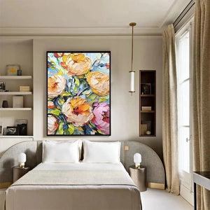 SUMMER BLOOM: Original impasto floral wall art in yellow, pink, orange on blue background, bedroom setting.