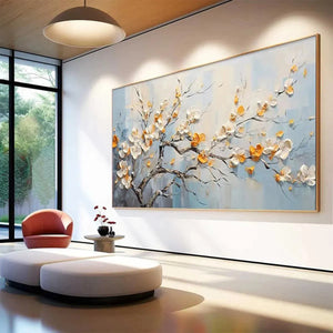 Textured white and gold floral painting 'Spring Blossoms' in a spacious contemporary living room setting.