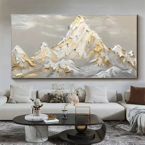 Original textured impasto mountain landscape painting in gold and grey, showcasing luxurious room decor.