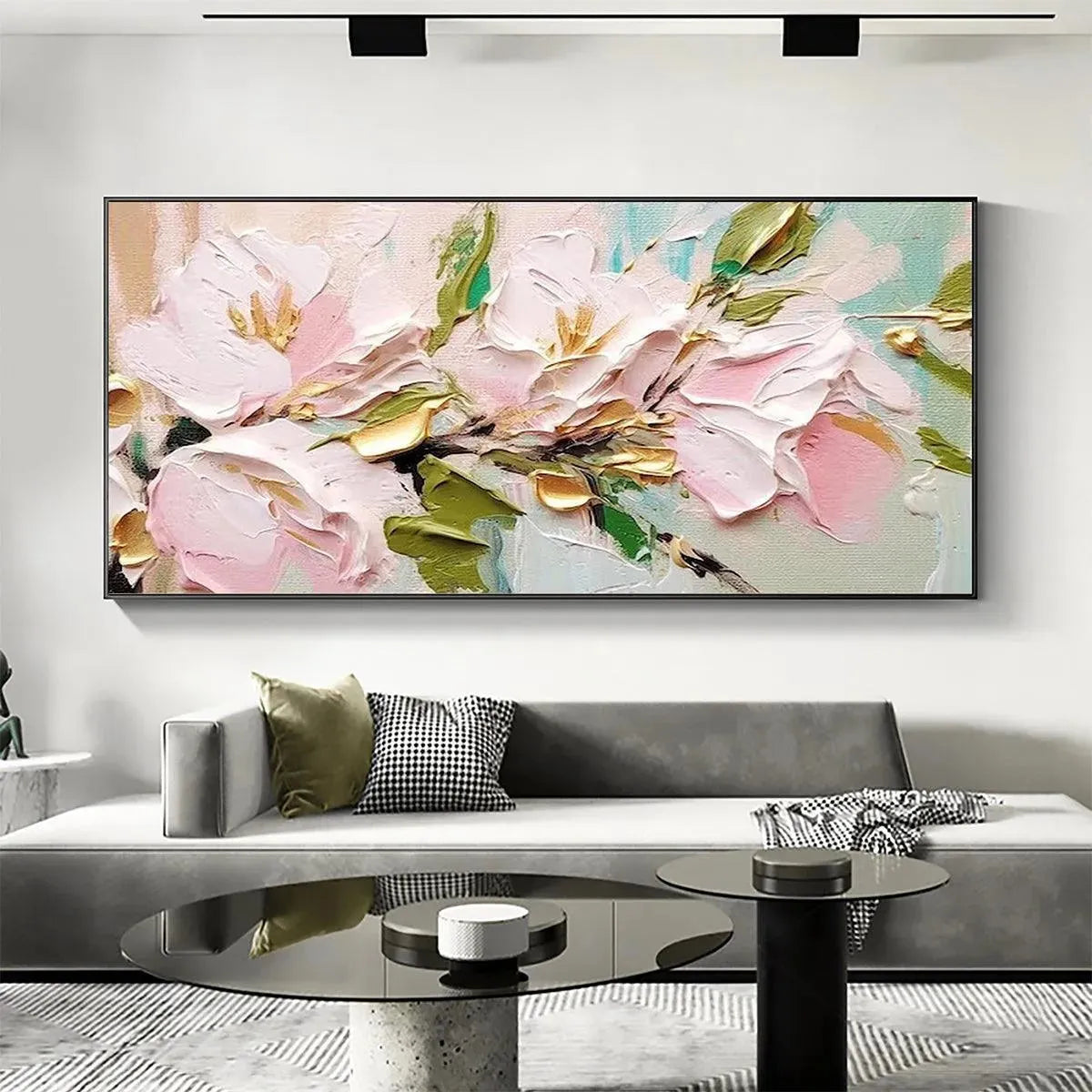 Golden Blush impasto painting showcasing pink flowers with gold accents, displayed in a lifestyle setting above a sofa.