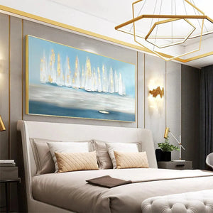 Horizontal 'Golden Sails' abstract seascape with gold accents & white sailboats, enhancing a modern luxurious bedroom.