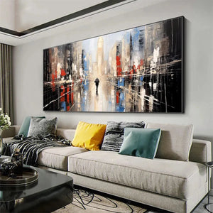 Javier Ramirez's Urban Solitude minimalist cityscape; solitary figure on wet street in a modern living room.