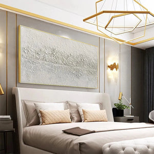 Javier Ramirez "Textured Whispers" painting in a bedroom, white textured abstract art with gold frame, modern decor
