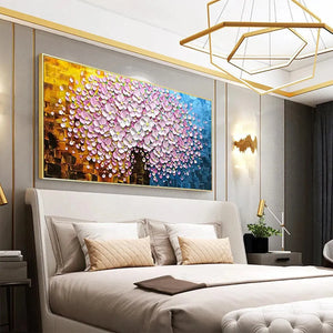 Pink Blossom Dream textured floral impasto painting with gold yellow and blue background above cream bed in modern luxury bedroom.