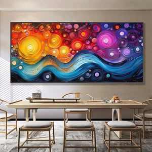 COSMIC WHIRL abstract painting by Willow Davies, impasto texture, vibrant swirls of warm colors blending into blue waves.