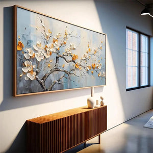 Spring Blossoms textured floral oil painting with white & gold blossoms, framed art above modern credenza.