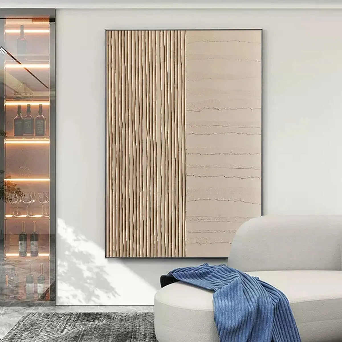 Javier Ramirez's textured beige minimalist painting with vertical and horizontal lines, framed, in modern decor.