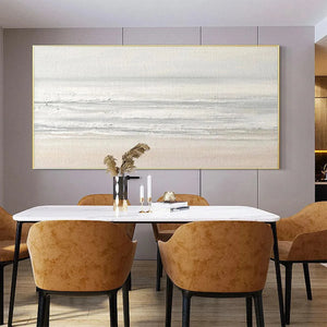Tranquil Coast painting by Liam O'Connell in dining room setting, neutral tones coastal art, modern home decor.