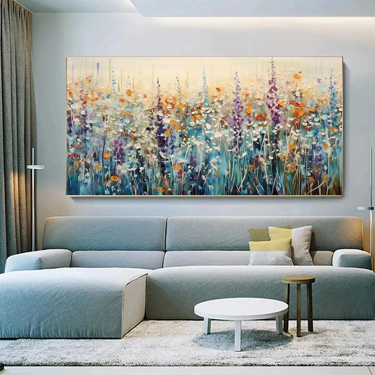 Impasto wildflower meadow painting in a living room. Vibrant purple, orange, blue, white blooms with textured strokes.
