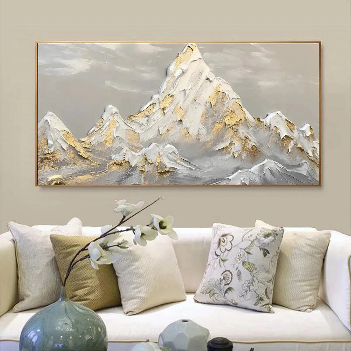Textured impasto painting of snow-capped mountains in gold and grey, showcasing product appearance and texture.