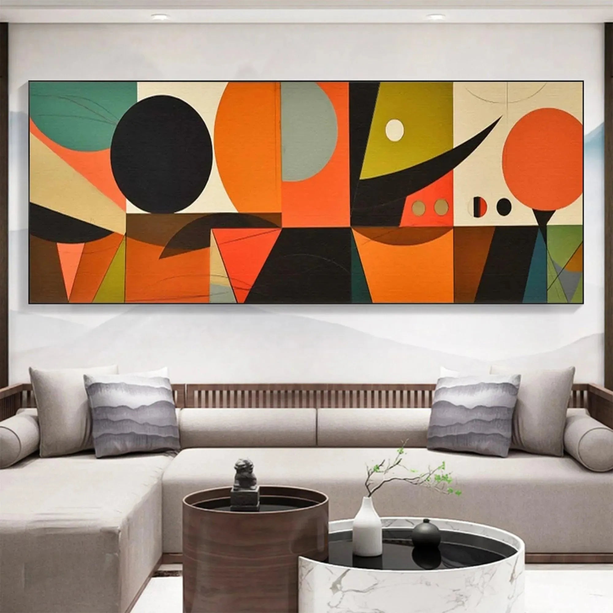 Panoramic mid-century modern abstract painting with geometric shapes in orange, black, and green, displayed in a living room.