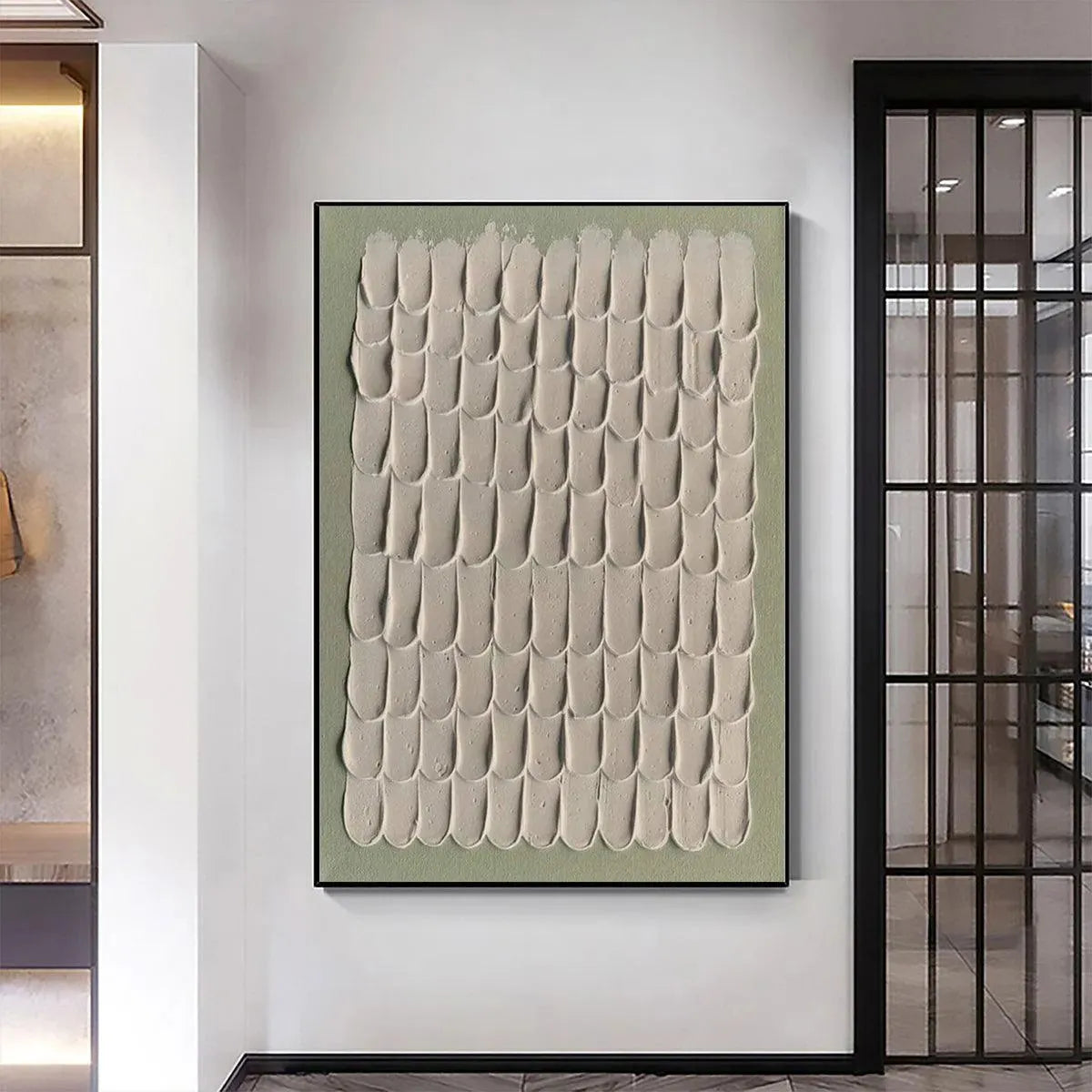 Textured Scales by Liam O'Connell, abstract art with scale pattern. Neutral tones on green canvas, framed in black.