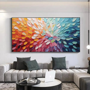 Rainbow Burst abstract painting by Willow Davies, textured impasto with rainbow hues, modern art for living room decor.