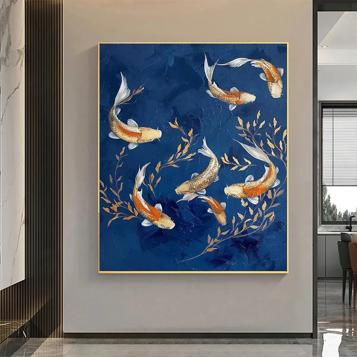 Vertical golden koi fish & foliage painting on textured royal blue, enhancing a contemporary home interior.