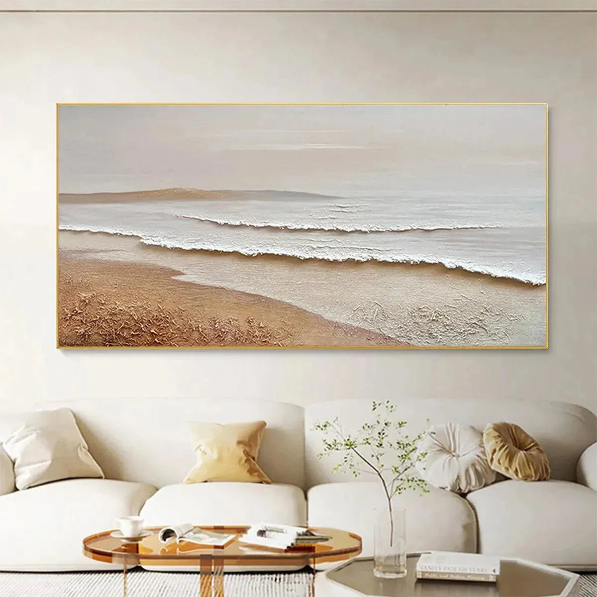 Textured impasto coastal painting 'Whispering Tides', beige & white serene waves, sandy shore, gold frame, living room decor.