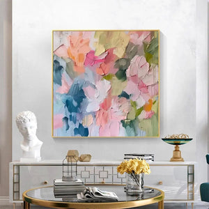 PASTEL DREAM textured abstract floral painting by Willow Davies in gold frame, displayed in a living room setting.