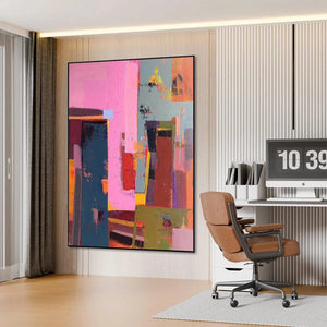 Pink City Abstract wall art by Willow Davies, modern vertical painting with pink, teal, red, and brown colors, framed.