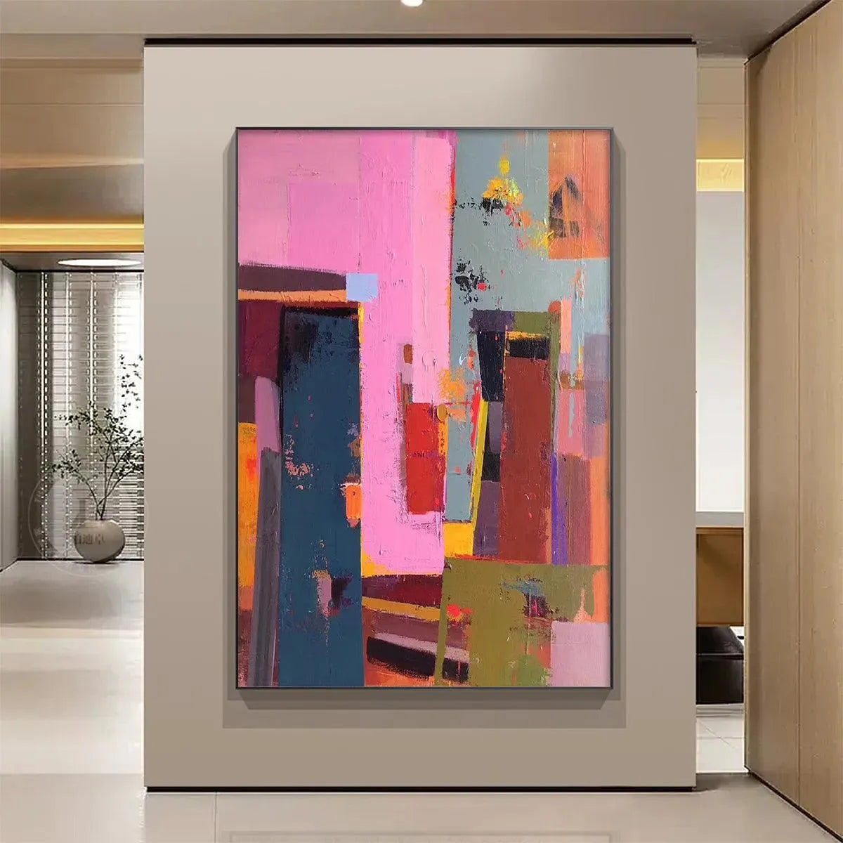 Pink City Abstract by Willow Davies, vertical wall art. Modern artwork in pink, teal, brown, and red, framed.