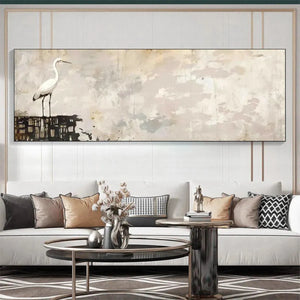 White Heron Panoramic artwork, minimalist heron painting on textured cream and grey background, shown in a modern room.