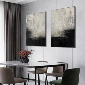 Liam O'Connell's black and white abstract diptych art set, adding modern style to dining room
