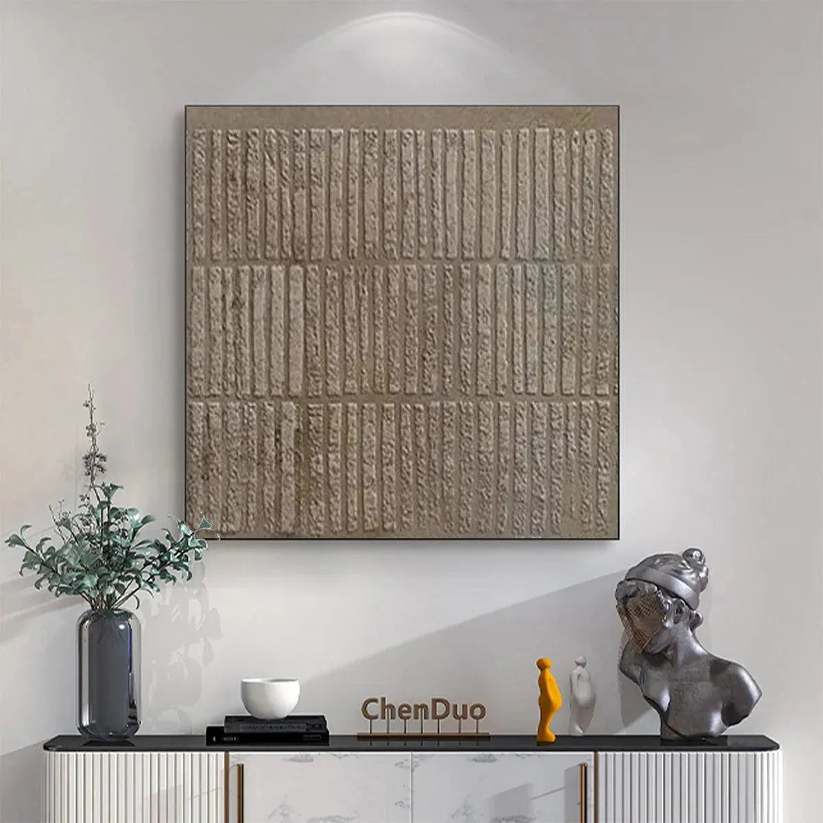 Minimalist Textured Brown Grid painting by Javier Ramirez, modern wall art, displayed above a console table.