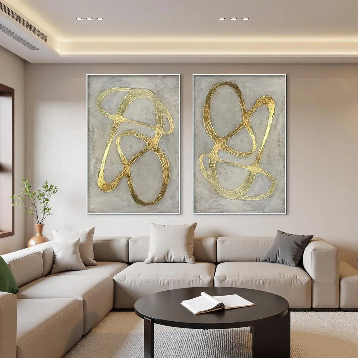 Two vertical abstract paintings with textured gray backgrounds and raised gold lines, silver framed.