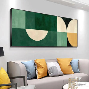 Green geometric panoramic abstract art with cream, mustard accents above sofa in modern living room.