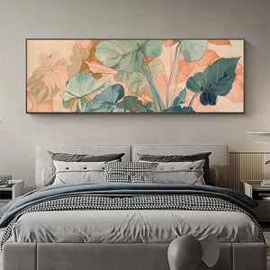 Panoramic botanical painting of teal & sage green tropical leaves with peach undertones above a gray bed.