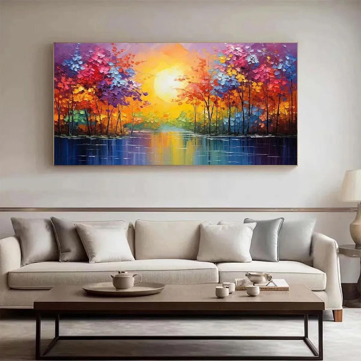 Willow Davies' 'Twilight Reflections' impasto landscape painting above beige sofa in living room.