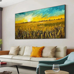 Golden Sunset Field painting by Isabella Rossi in a living room, wheat field at sunset, framed artwork for home decor