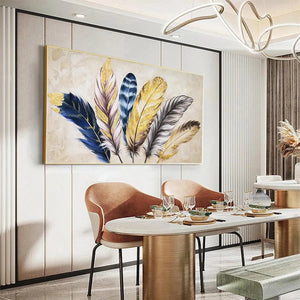 Golden Feathers painting by Elodie Dubois, featuring elegant feather artwork in blue, gold, and grey tones for wall decor.