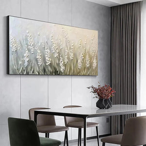 Panoramic textured white floral impasto painting displayed in a modern dining room.