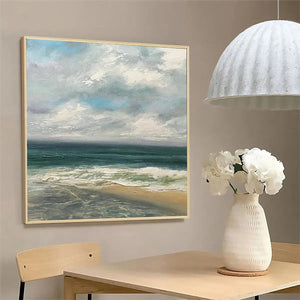 Liam O'Connell framed coastal painting: teal waves, sandy beach, cloudy sky. Serene ocean artwork.