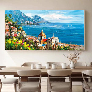 Impasto oil painting of a Mediterranean coastal town with colorful buildings, blue sea, mountains, and sailboats.