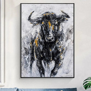 Textured impasto painting of a charging bull in black, white, and gold accents. Vertical wall art.