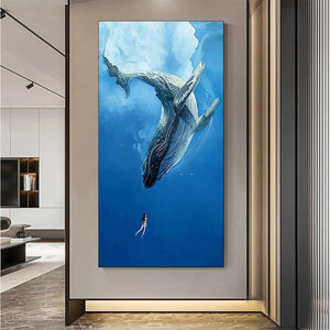 Ethan Walker Whale Encounter vertical wall art. Blue ocean painting with whale and diver, framed, nature-inspired home decor