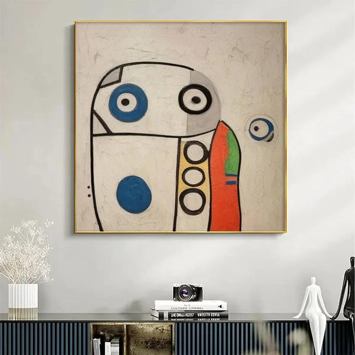 Abstract Figure square wall art by Willow Davies: Colorful modern painting in a gold frame for living room.
