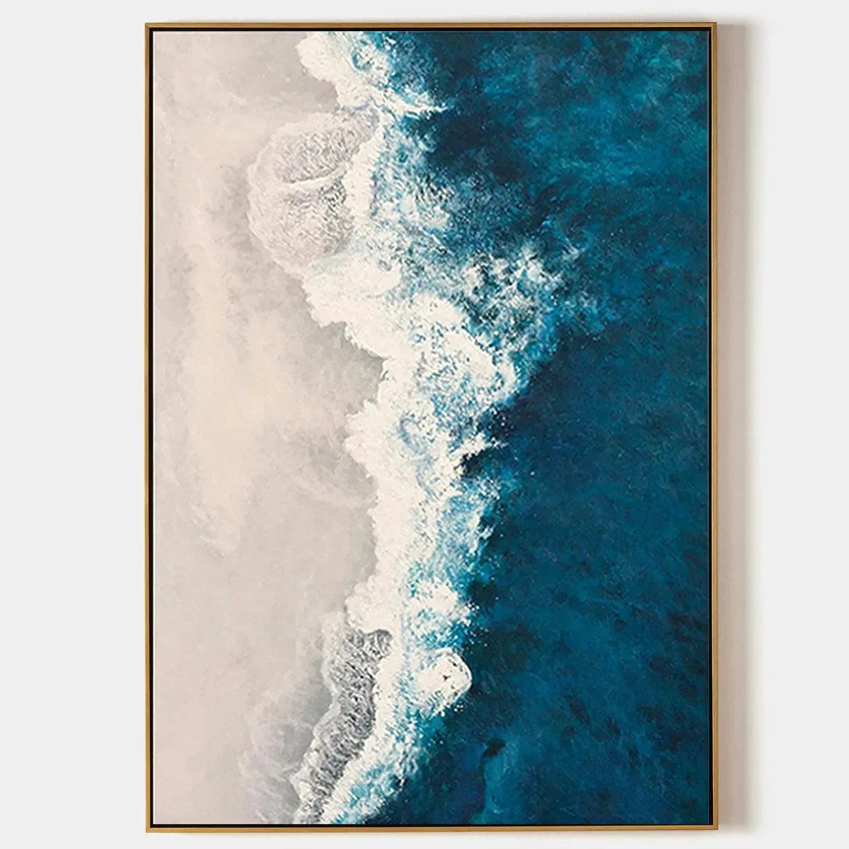 Azure Coast abstract coastal painting, vertical artwork with crashing blue waves and beige seafoam, framed in gold.