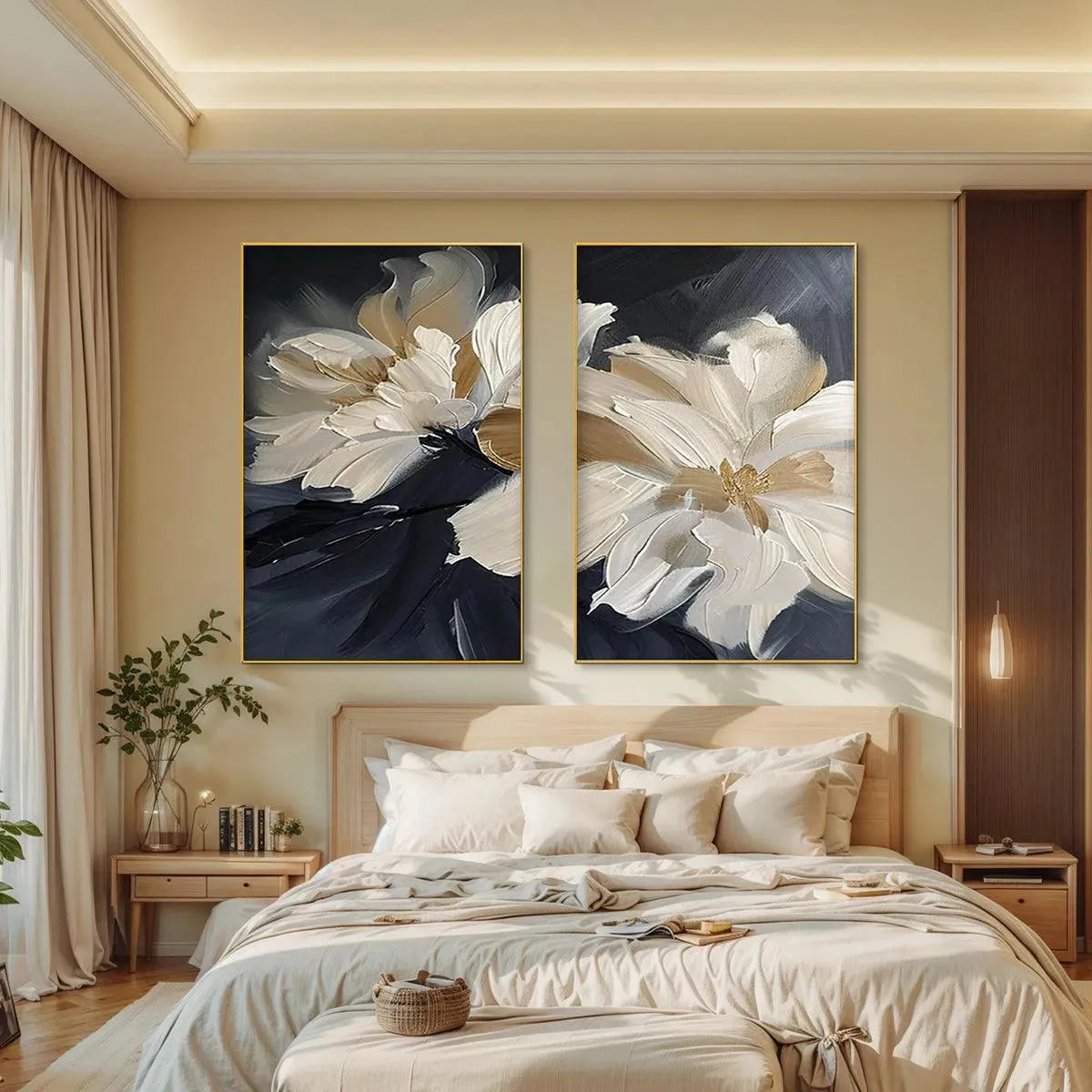 Abstract floral diptych paintings with white and gold impasto petals displayed above a bed in a bedroom.