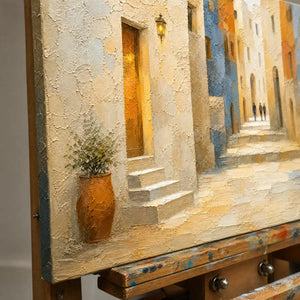 Close-up detail of Sunlit Old Quarter showing hand-painted texture and part of the frame