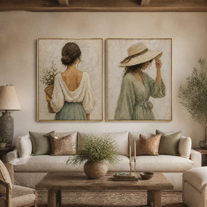 Twin bohemian muses diptych oil painting in gold frames above a neutral sofa