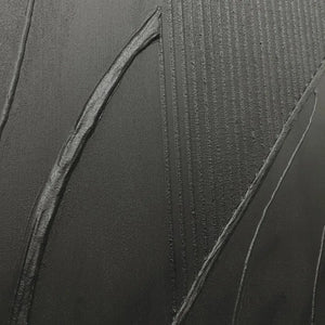 Black Textured Abstract painting by Javier Ramirez with gold frame, minimalist artwork for modern interior