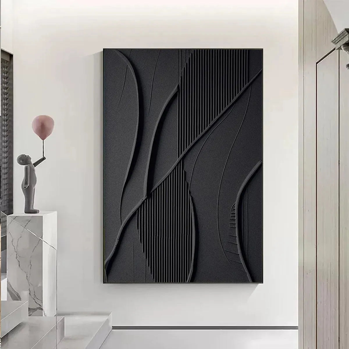 Black Textured Abstract painting by Javier Ramirez with gold frame, minimalist artwork for modern interior