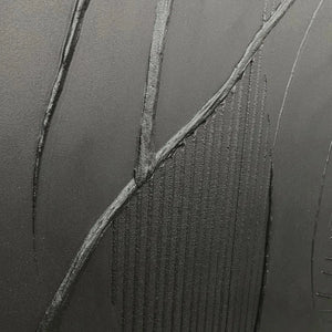 Black Textured Abstract painting by Javier Ramirez with gold frame, minimalist artwork for modern interior