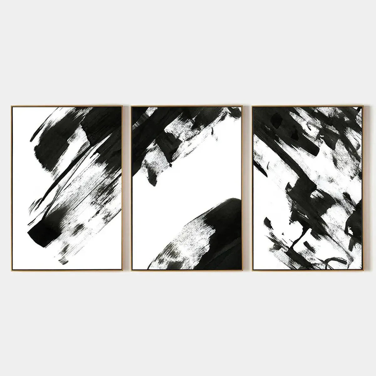 Black white abstract triptych wall art set, bold brushstrokes, modern vertical design for living room or office.